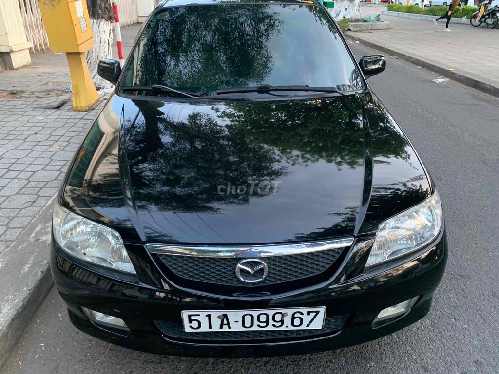 Mazda 323-2003 семейный автомобиль