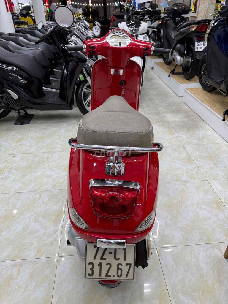 Фото 2: Piaggio Vespa LX 125 2012 Красный 30000 км