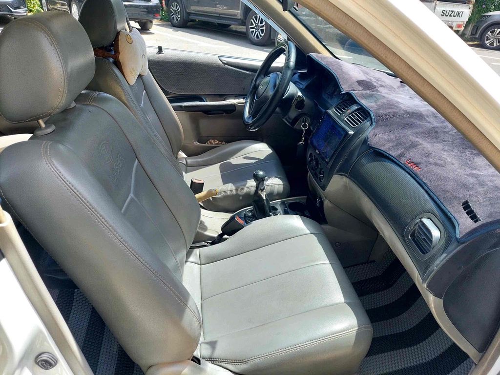 Ford Laser 2024 механическая, белый, 5 мест