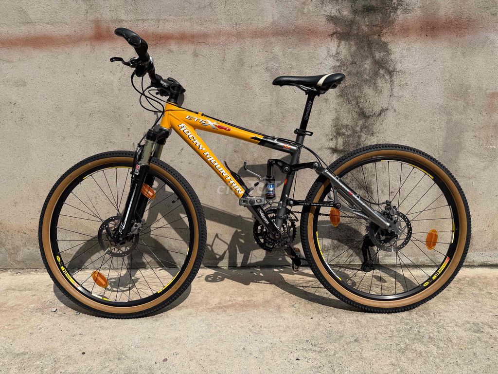 Горный велосипед Rocky Mountain ETS X-50 серо-желтый