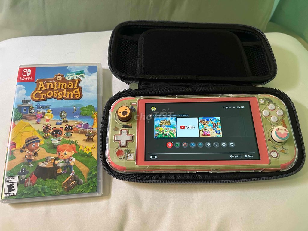 Nintendo Switch Lite розовый в комплекте с игрой Animal Crossing