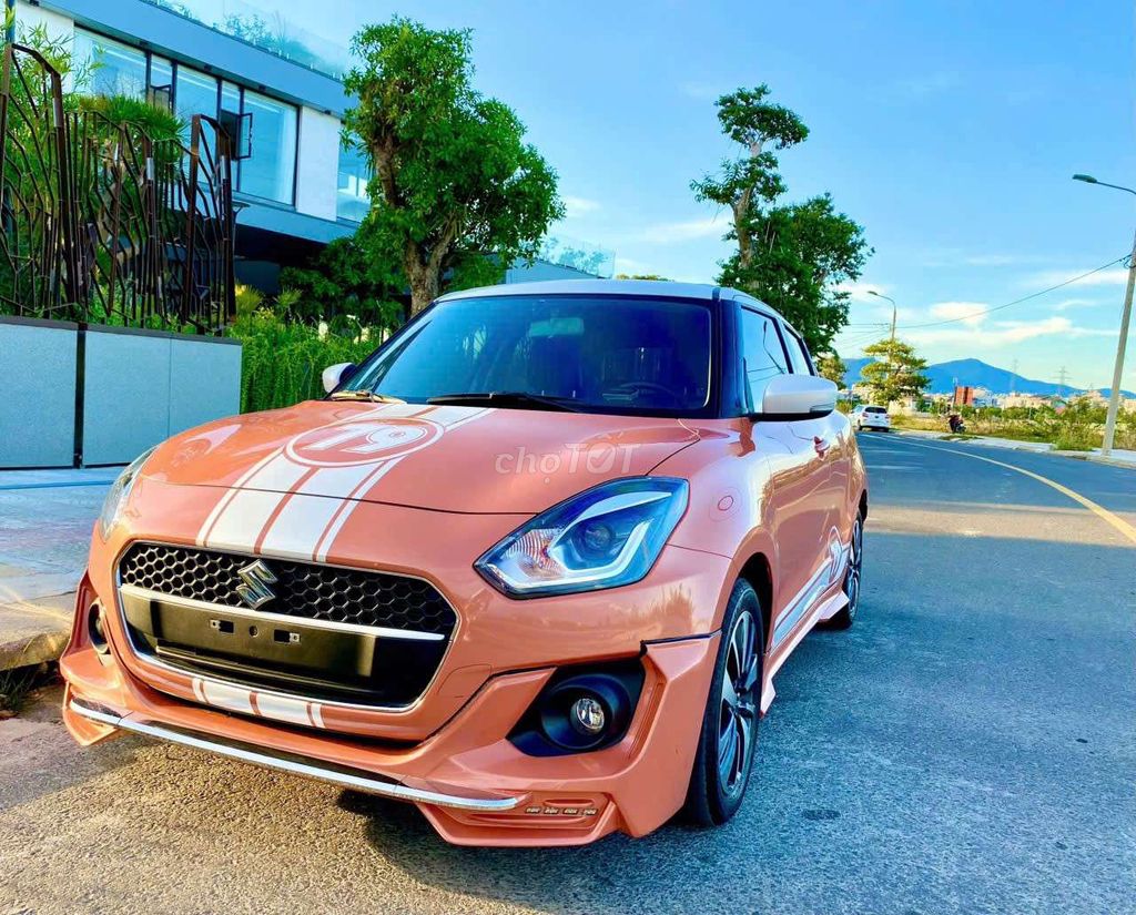 Фото 2: Suzuki Swift 2020 45000 км оранжевый