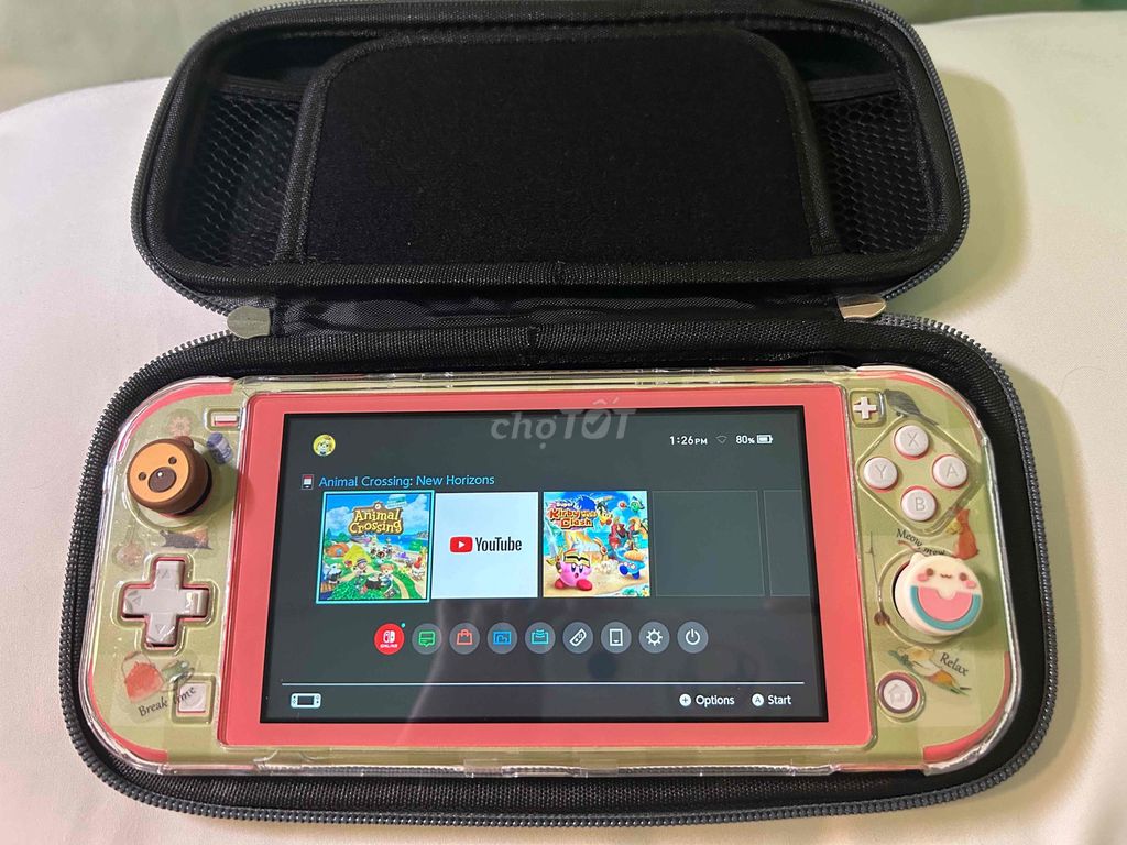 Фото 2: Nintendo Switch Lite розовый в комплекте с игрой Animal Crossing