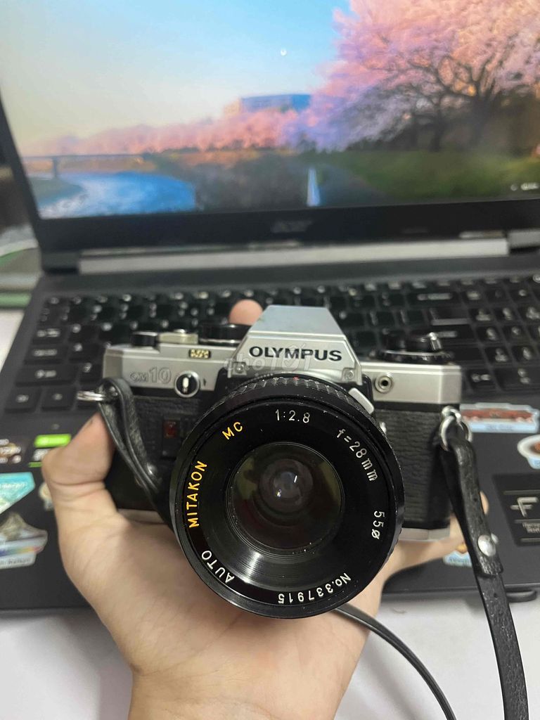 Пленочный фотоаппарат Olympus OM-10 серебристый, черный