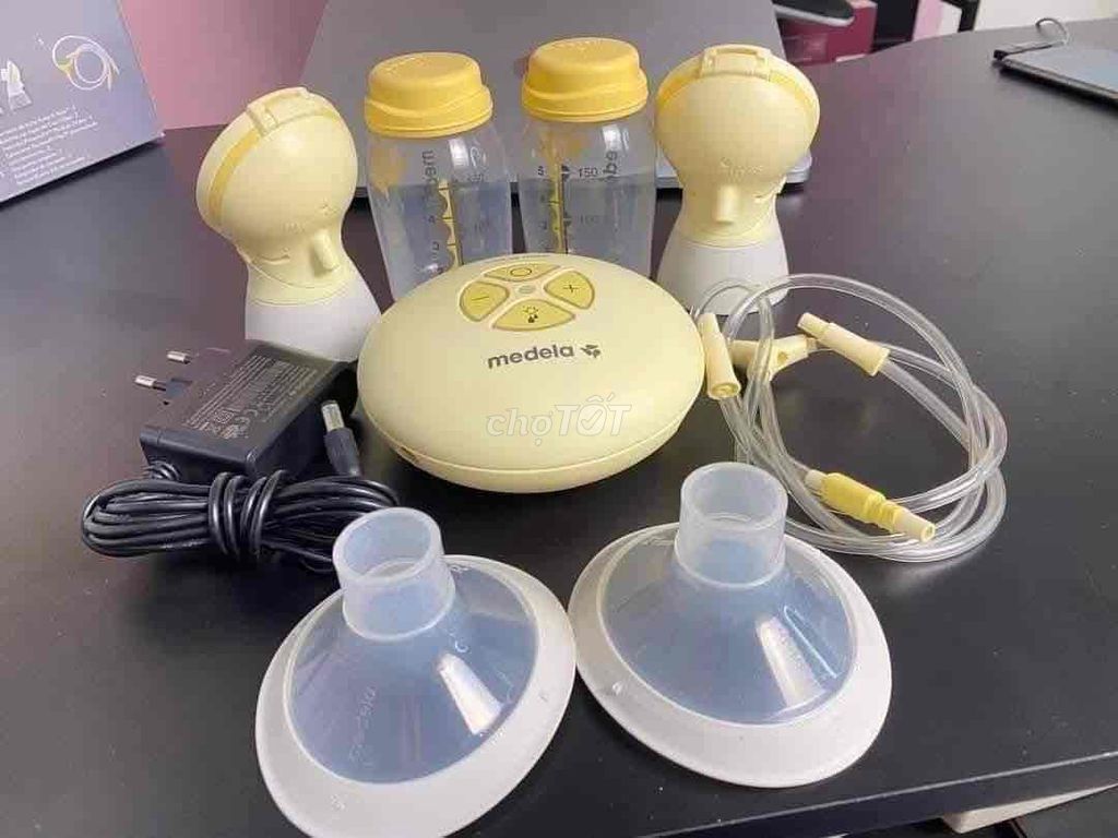 Молокоотсос Medela Swing Maxi Flex желтый