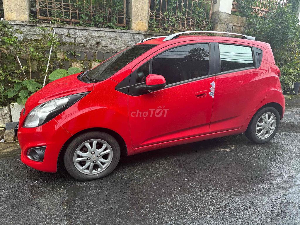 Фото 3: Chevrolet Spark 2013 автоматическая 90000 км красный