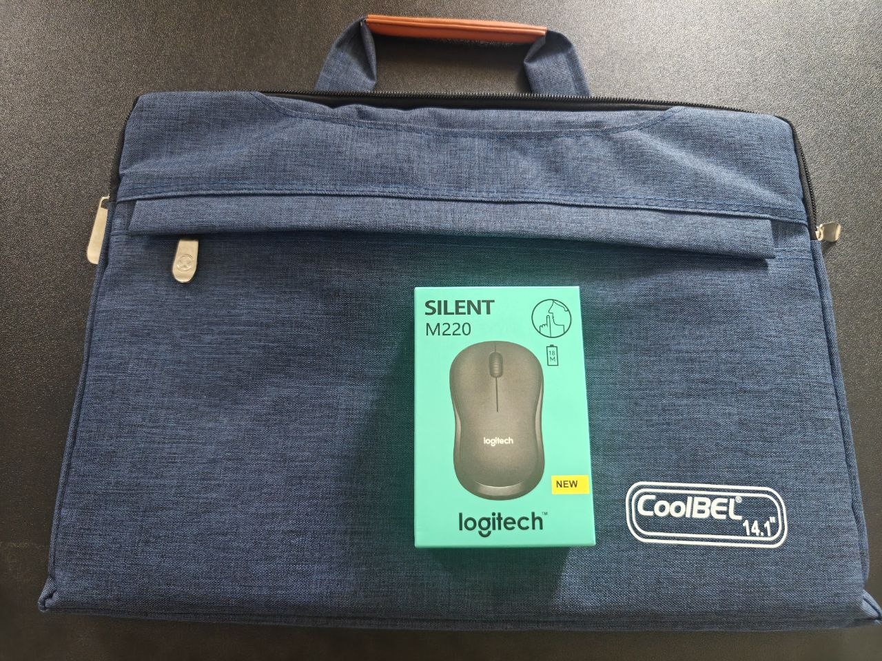Продаётся новая сумка для ноутбука и мини-мышь Logitech